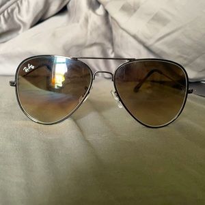 Brand new Ray Bans. Never worn, no scratches, comes with case and cleaning rag.